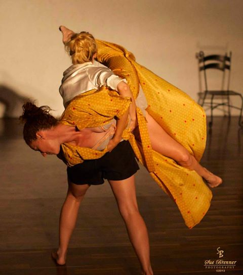 Anne Gehman scoops up Cecily Holcombe in "every one comes to be clear." Photo:  Sue Brenner