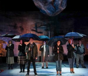 The cast of 'When the Rain Stops Falling' stands stoically amid a serious rainstorm, whose repercussions far exceed the sky. PHOTOS BY KEN JACQUES   