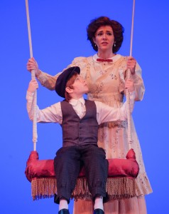 Carolyn Agan, the archetype Mother, swings Elliot Weaver, as Little Boy in San Diego Musical Theatre's "Ragtime." Image: Ken Jacques