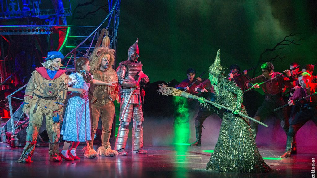 Wicked Witch of the West with soft-serve wig and broom in The Wizard of Oz. Courtesy image