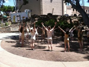 Image of nudists invading San Diego's Balboa Park and performing pagan rituals on May 22, 2016.