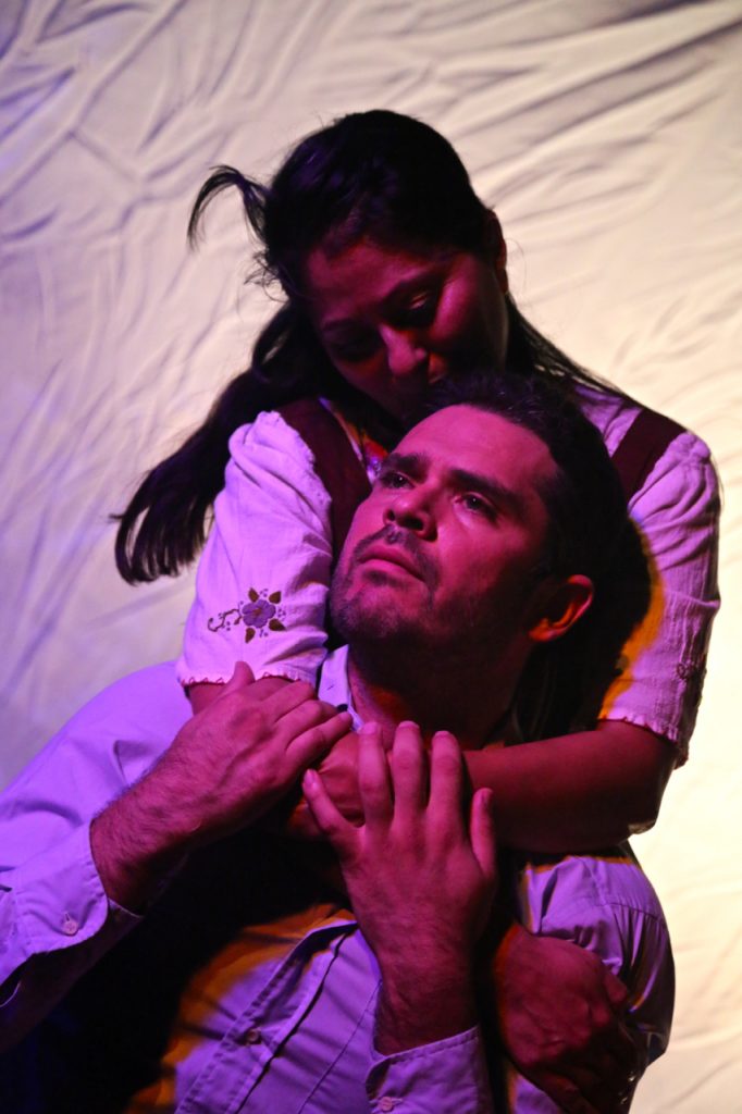Belen (Sandra Ruiz) has her work cut out as physician husband Moises (Jorge Rodriguez) is torn between his senses of duty and betrayal. Photo by Adriana Zuniga-Williams Photography.